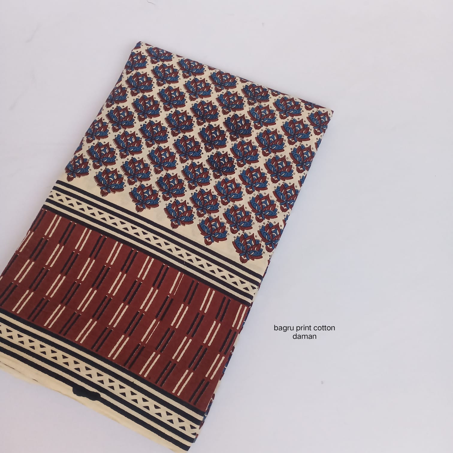Blue and maroon Bagru handblock printed cotton fabric with ornamental daman border, artisan wholesale fabric from Fabtexs